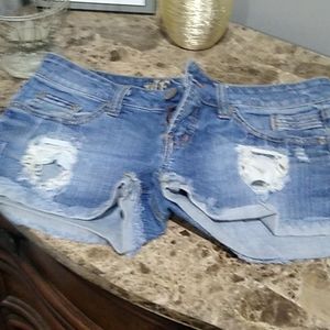 Distressed jean shorts